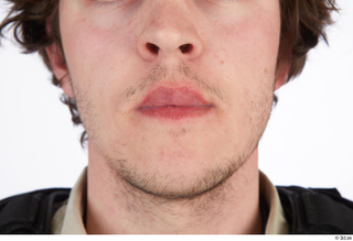Photos Reece Bates 2 - details of uniform mouth nose…